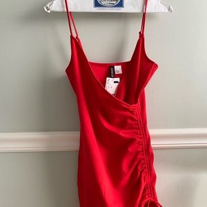 red ruched bodycon dress